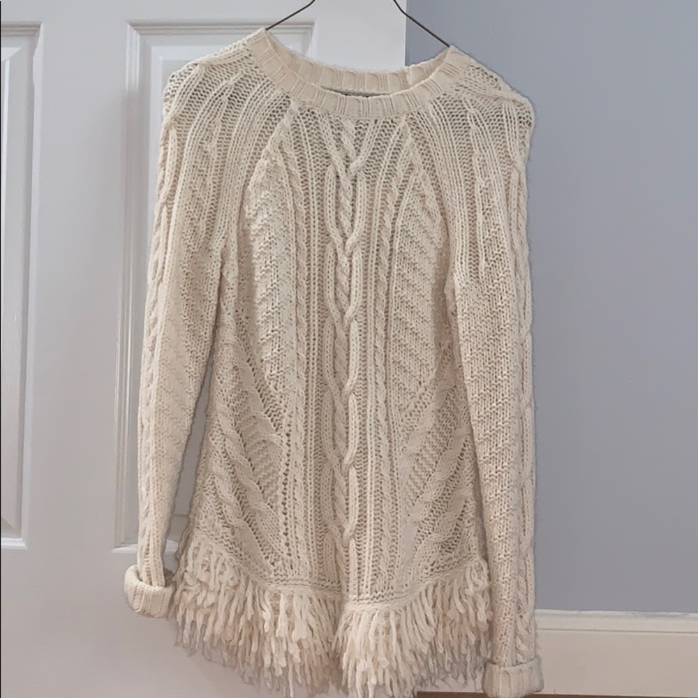 knitted cream sweater with fringe